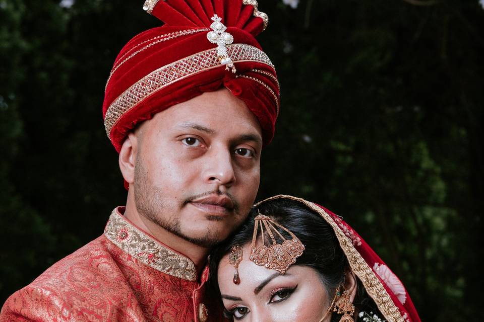 Soft smiles from newlyweds