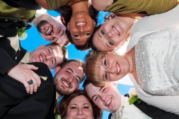 The couple with the bridesmaids and groomsmen