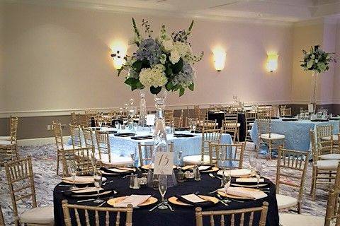 Delicate chairs surrounding a magnificent centerpiece