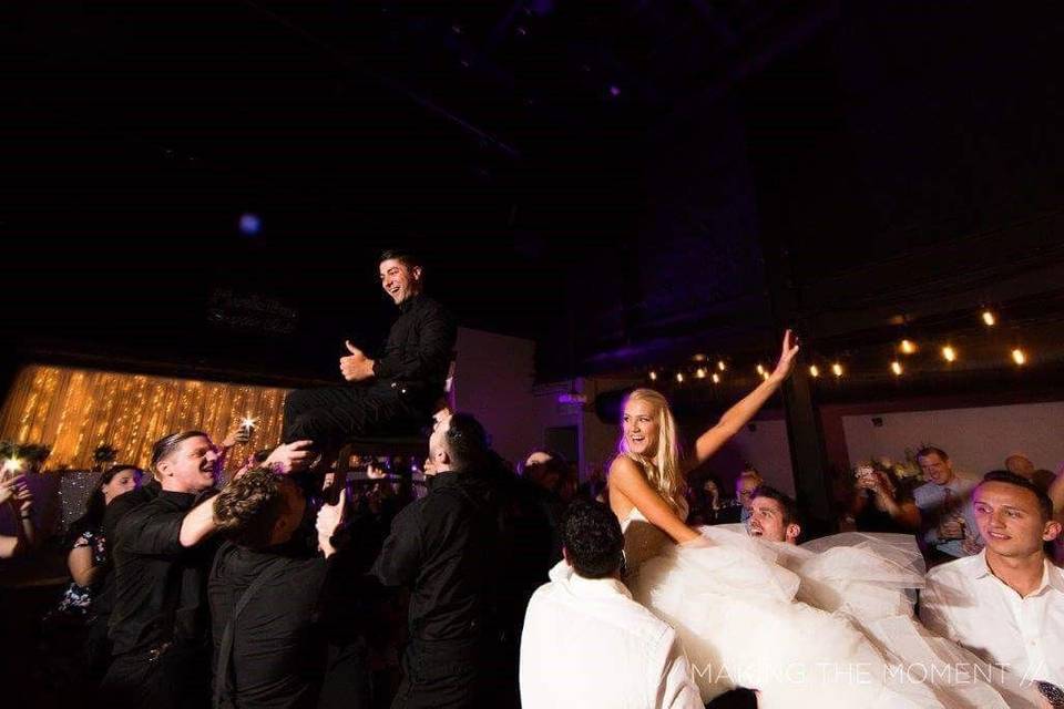 The bride and groom dancing