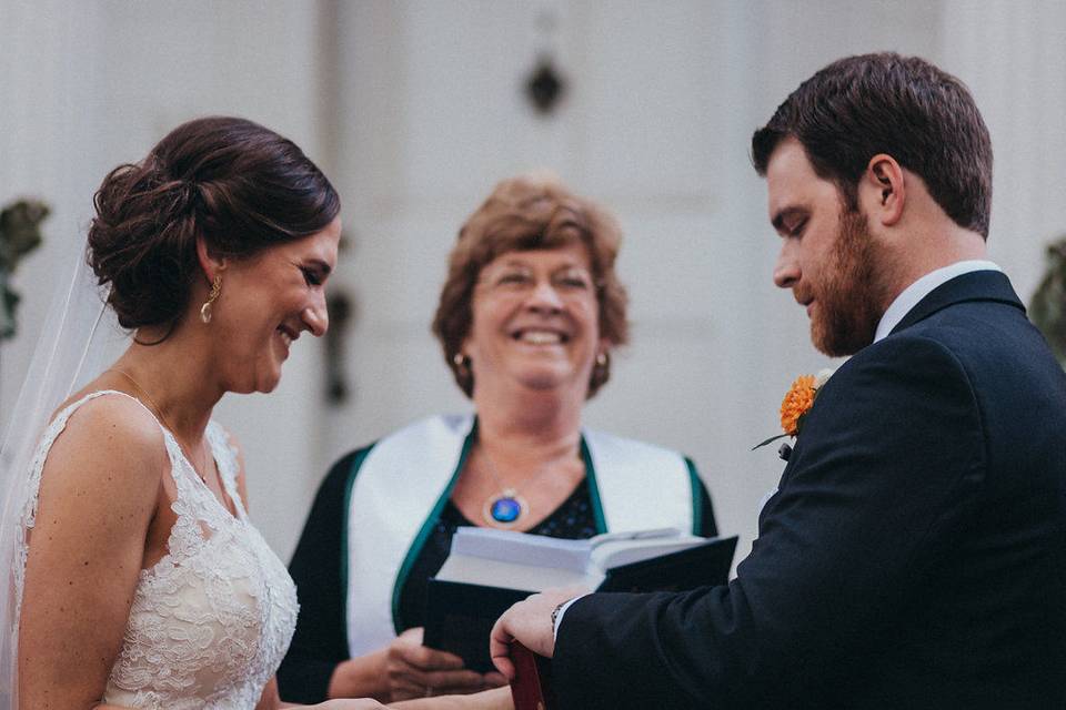 Holding the bouquet.