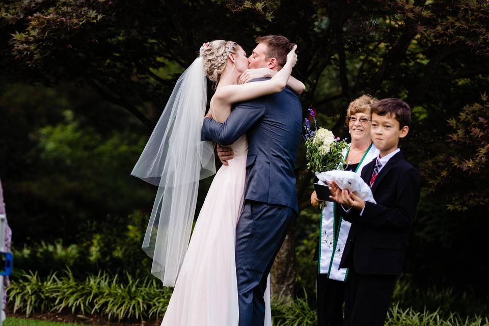 Holding the bouquet.