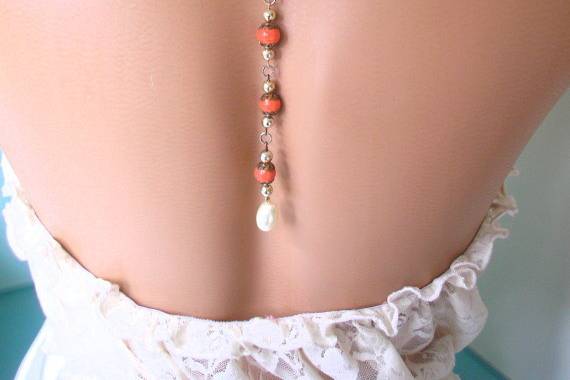 Handmade repurposed vintage pearl and coral bead bridal backdrop necklace by Crystalpearl on Etsy.  This piece is one of a kind and therefore unique.