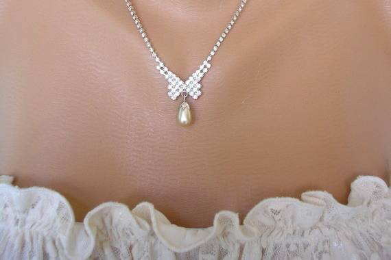 Sweet little single strand rhinestone bridal necklace with pearl drop detail by Crystalpearl on Etsy.