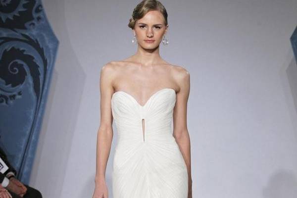 Mark Zunino MZBS1206
Hand draped illusion over matte jersey with keyhole front, flounce and train of white hackle feathers on silk chiffon