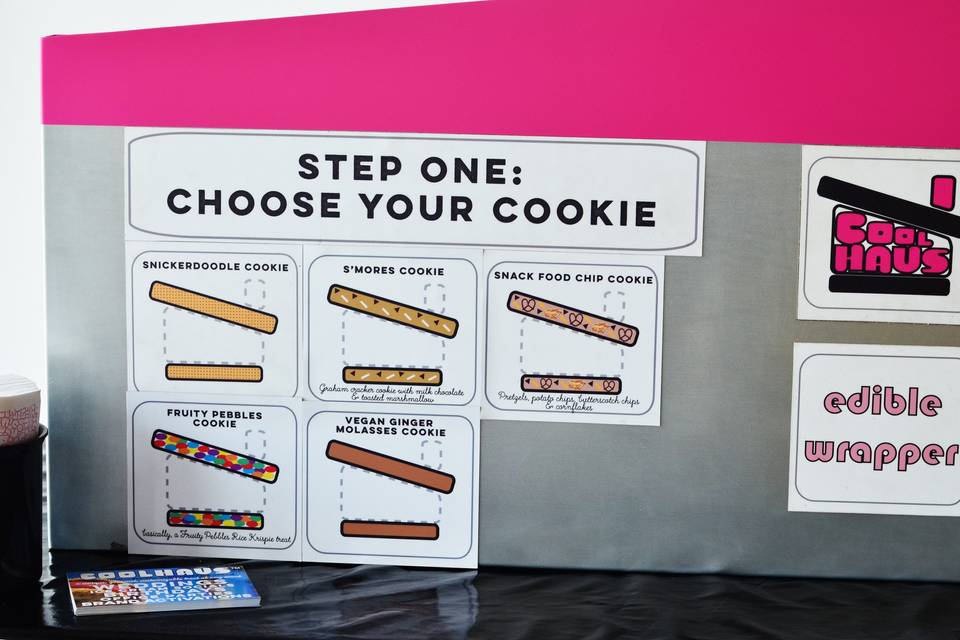 The Coolhaus pop-up bar set up was created to resemble our iconic ice cream truck. The table topper also hides the behind-the-scenes action that goes into making your guests' ice cream sandwiches. A plain tablecloth can also be used in order to blend in with your wedding theme.