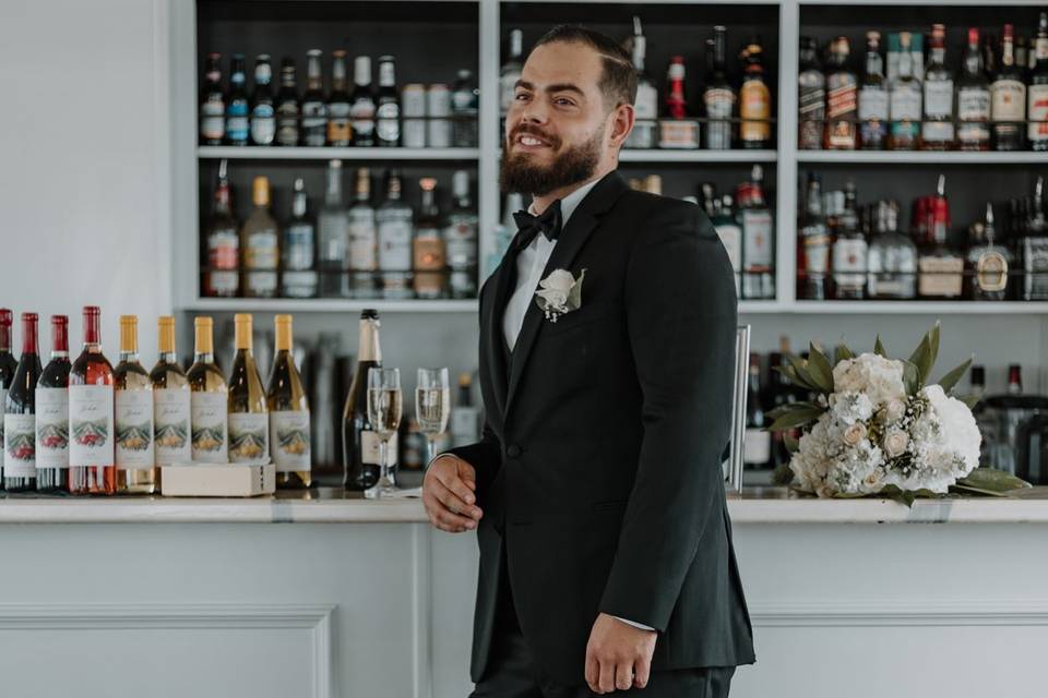 Groom at Upper Salon bar