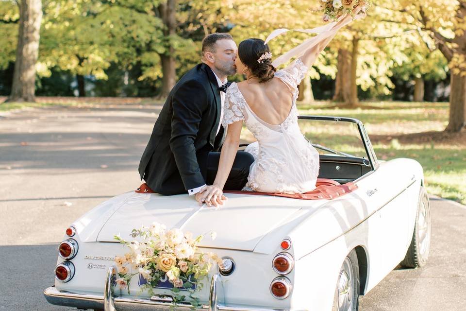 Vintage getaway wedding car