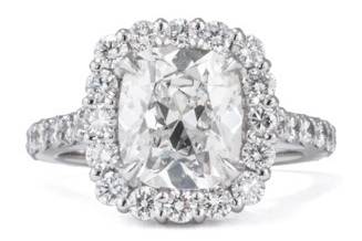 Engagement Ring in 18k white gold with a cushion cut center and a pave set shank. Color and Clarity: F VS2
Total Carat Weight: 2.20 center / 3.00 total
