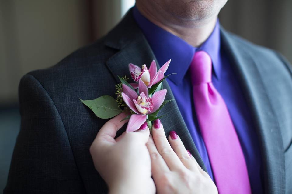 Applying the boutonniere