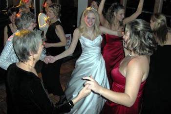 Bride dancing with guests