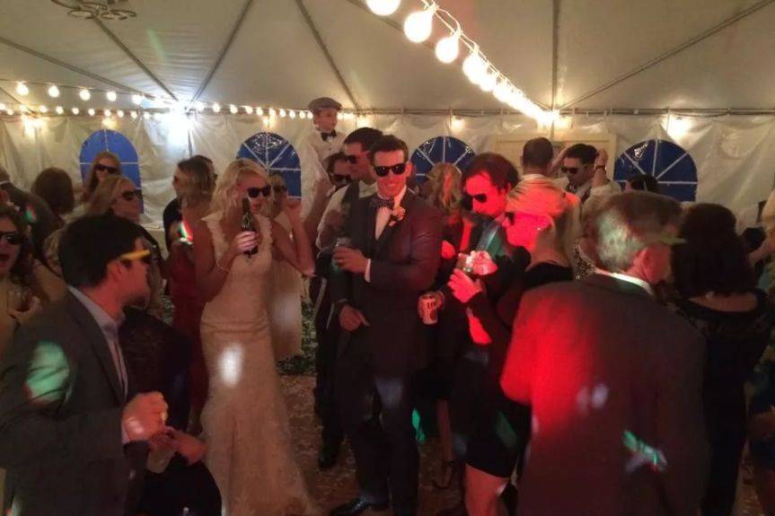 The couple and their guest dancing