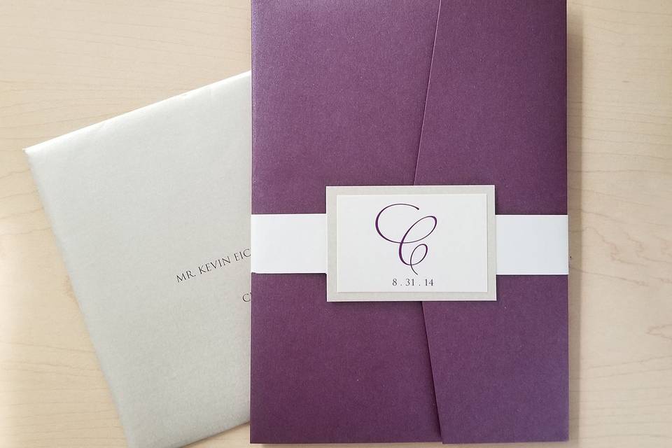 Wedding invite package put together with belly band on shimmer stock with shimmer folder and envelope.