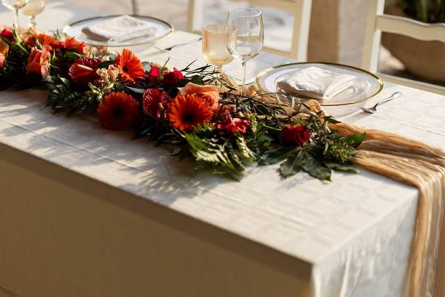 Wedding table with florals at golden hour