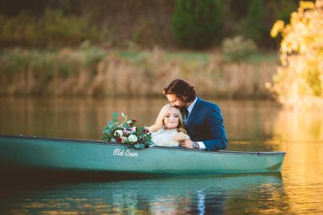 Couple's portrait in a canoe