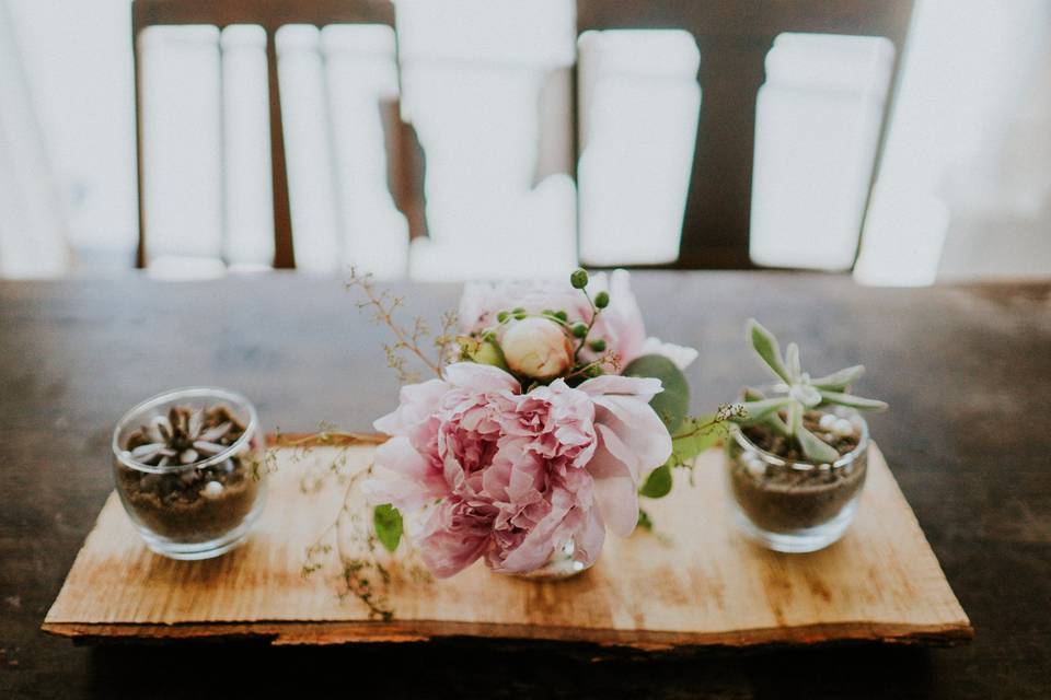 Floral centerpiece and succulents