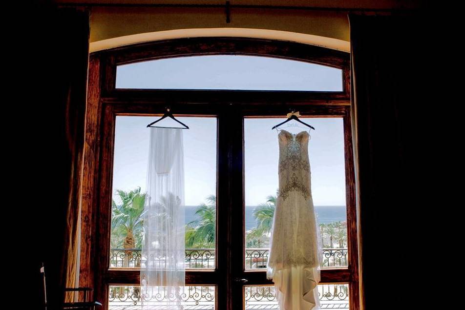Dress hung by the window