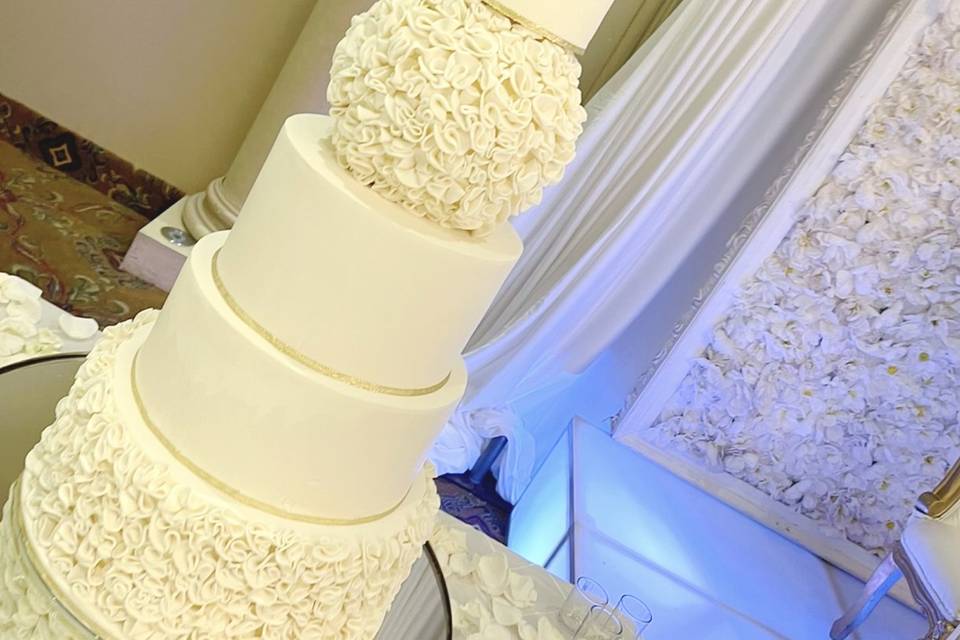 White and gold wedding cake