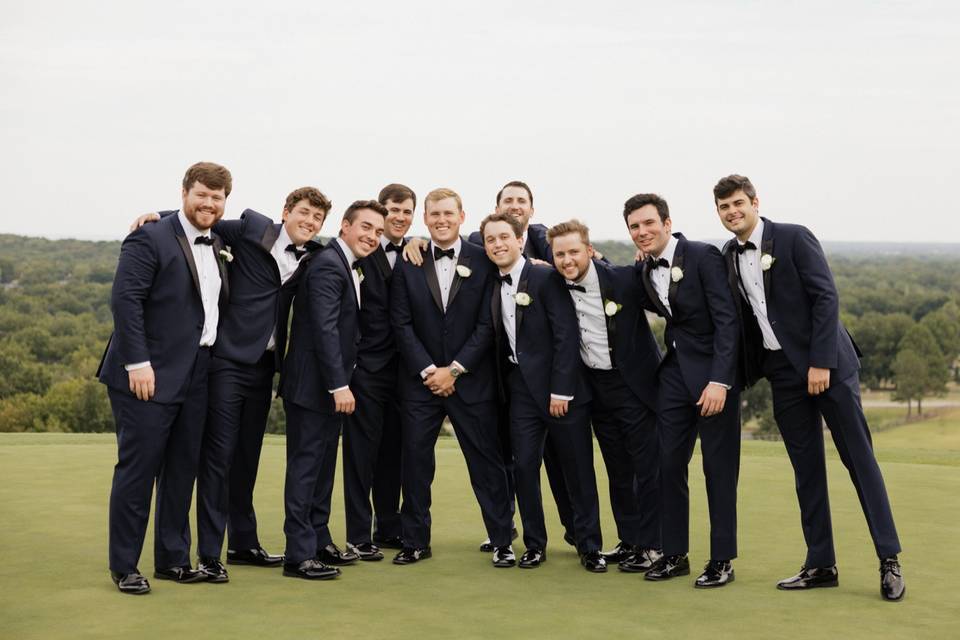 Deep navy peak lapel tuxedos
