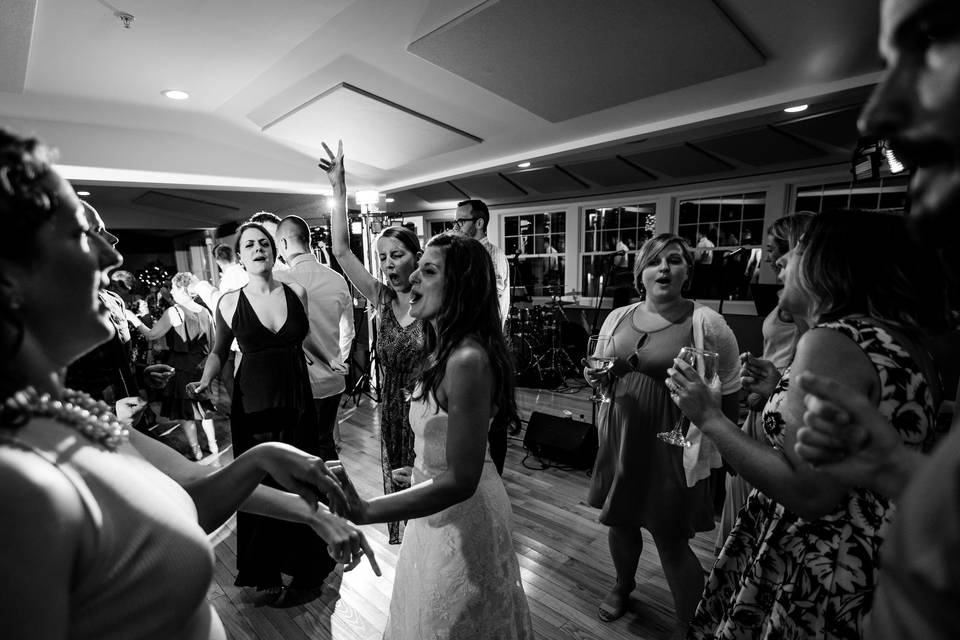 The bride dances with her guests