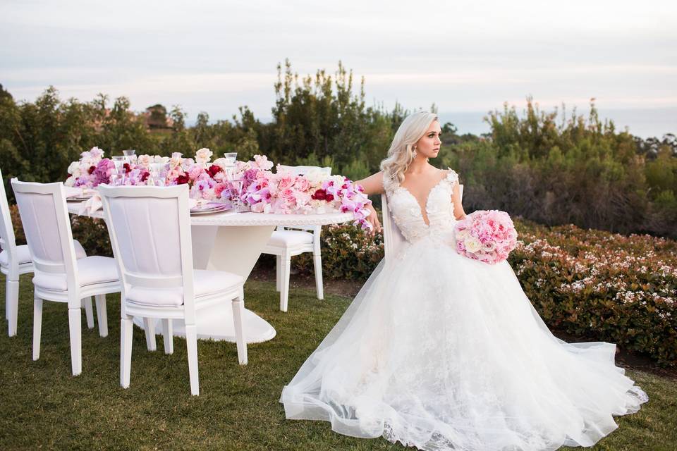 Planning & Design: @soniasharmaevents Design, Decor, & Rentals: @revelryeventdesign Florals: @bloomboxdesigns Photographer: @dukeimages Venue: @pelicanhillresort Table Top Rentals: @TheoniCollection Bridal Retailer: @abridebysamantha Bridal Designers: @samanthaelizabethdesign @naama_and_anat_bridal, @julievinobridal Cake: @specialcakesla Makeup & Hair: @makeuptherapy Paper Goods: @CordiallyCouture