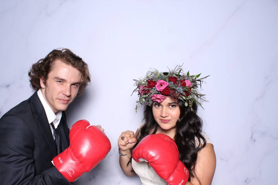 Newlyweds with boxing gloves