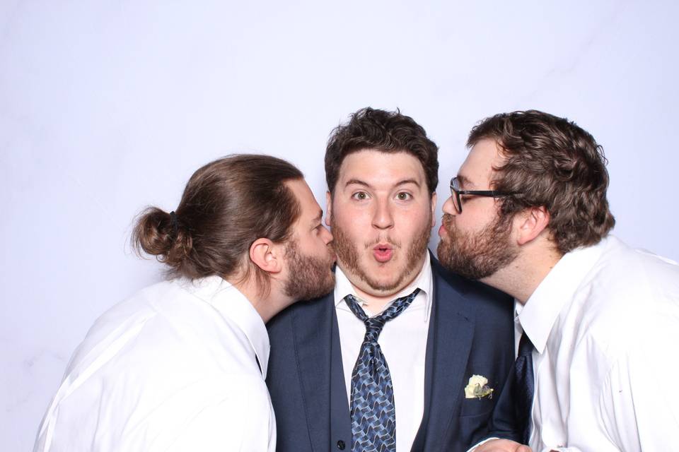 Kisses for the groom