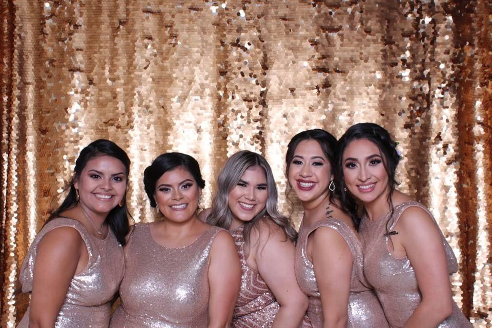 Gold backdrop for the bridesmaids