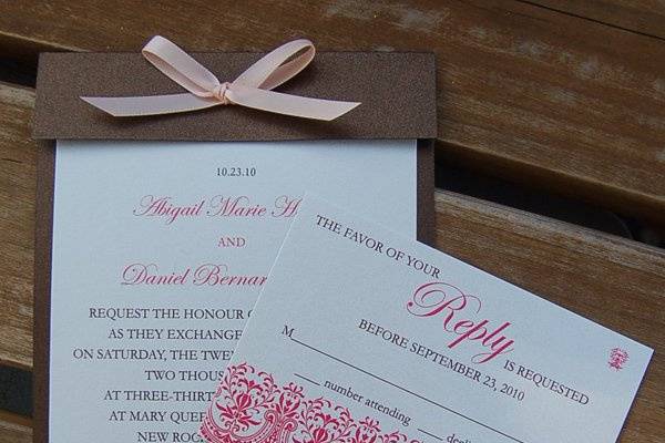 Simplicity at its best. This understated beauty is all about color, design and the sparkling finish of the paper. The Abigail Layered Wedding Invitation is a gorgeous combination of a rich chocolate brown, ivory and peach