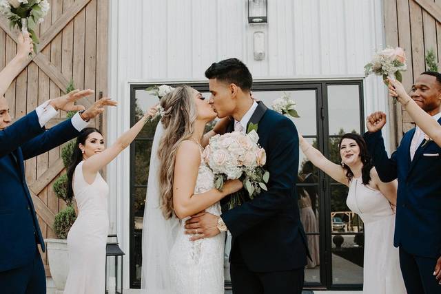 The couple kisses