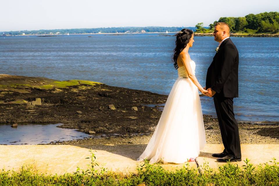 By the water