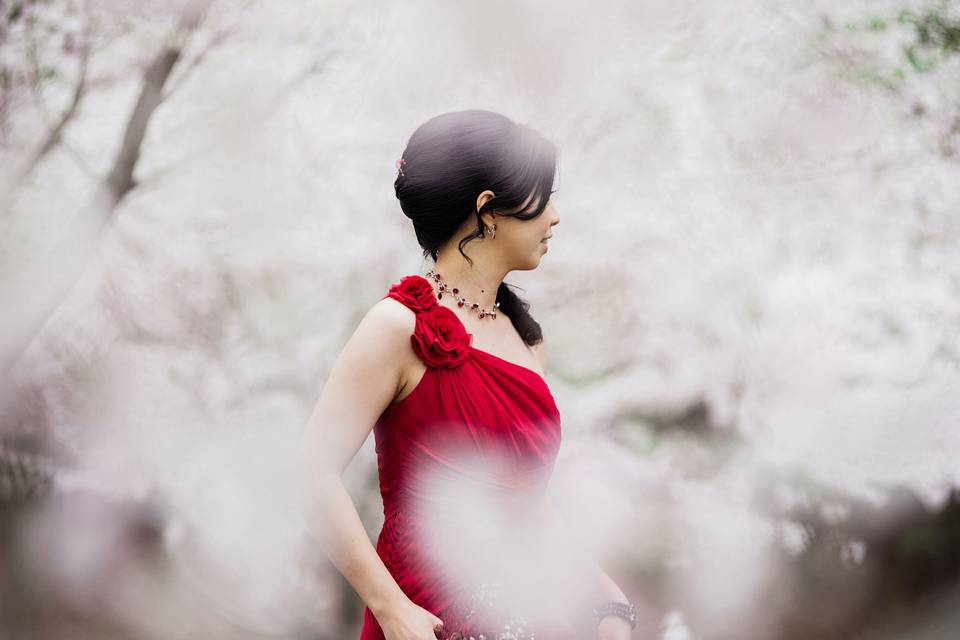 bride in cherry blossoms