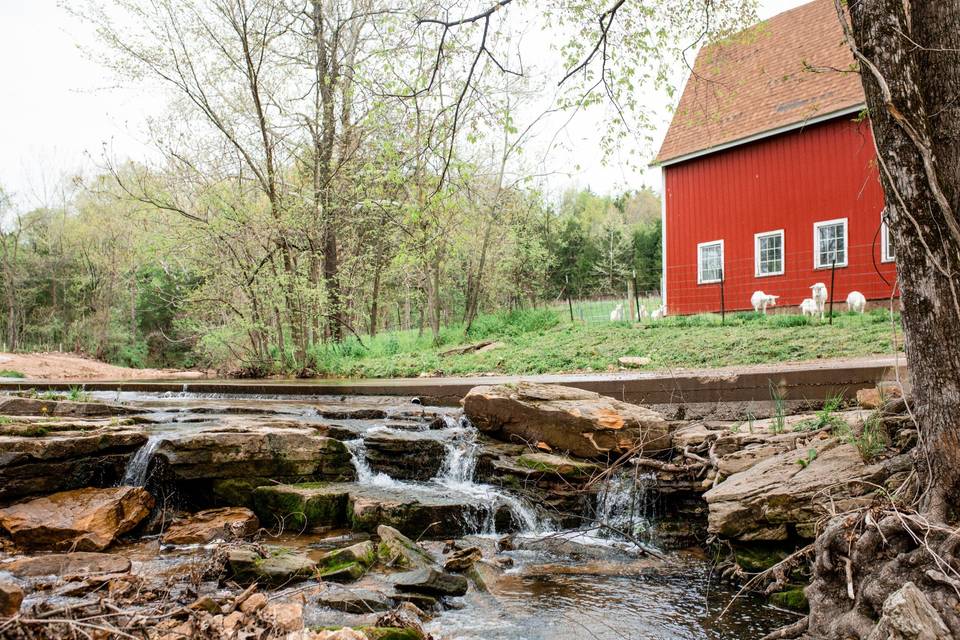 Picturesque creek and barn