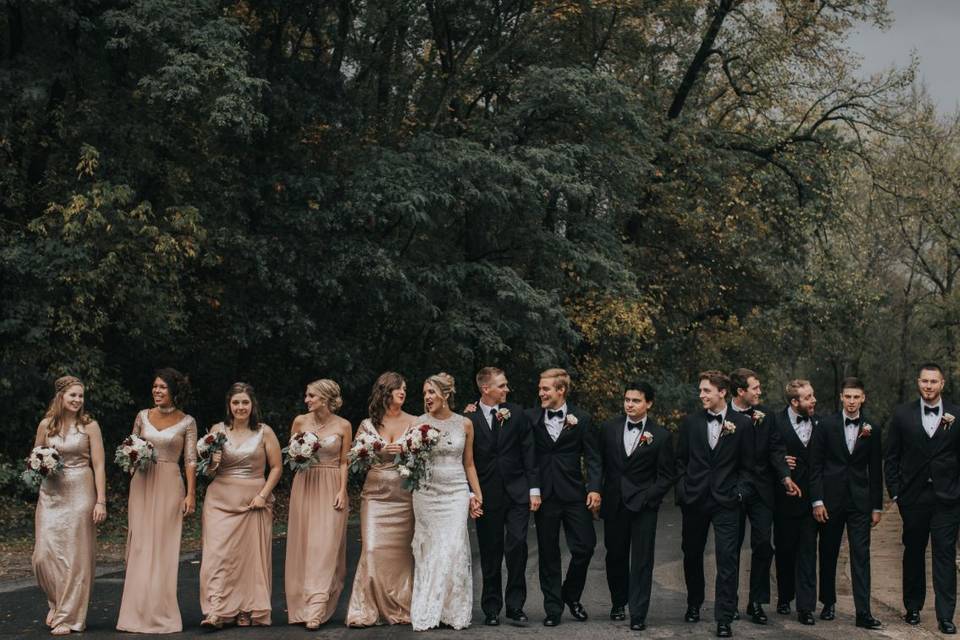 The couple with the bridesmaids and groomsmen