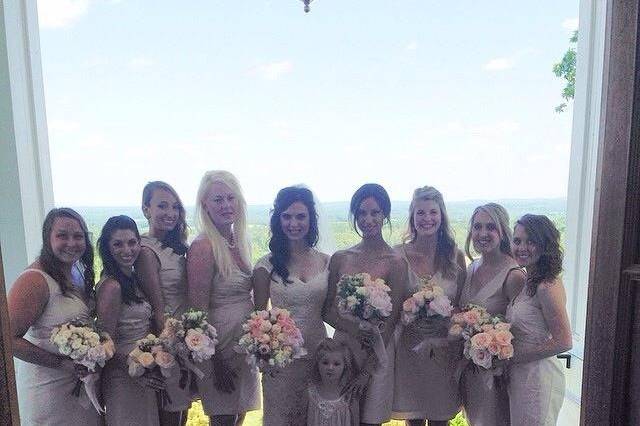 Bride with the bridesmaids and flower girl