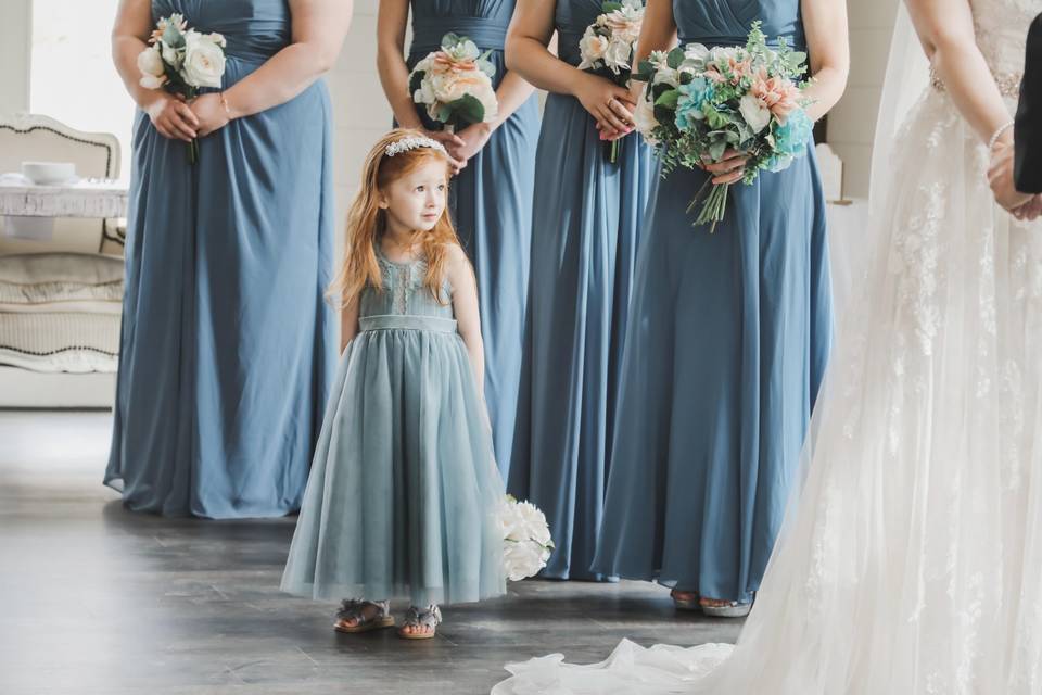 Flower girl watches the vows