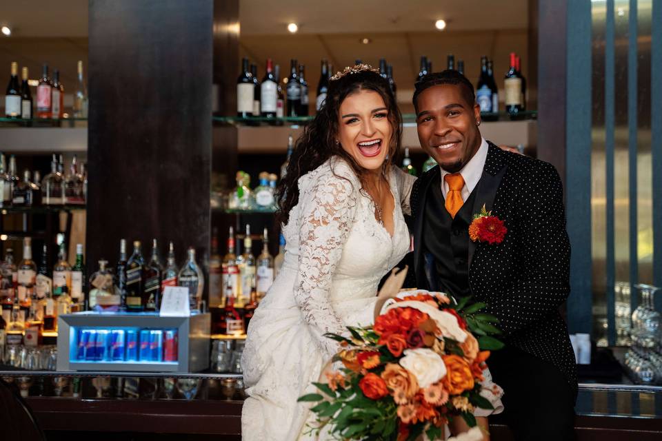 Couple at bar.