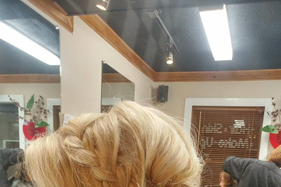 Loose braided side updo