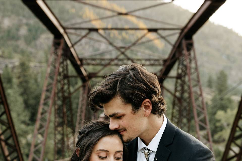 Bride and groom on the bridge