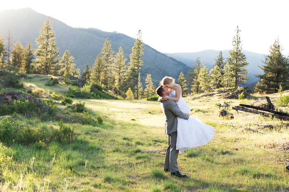 Bride and groom by river