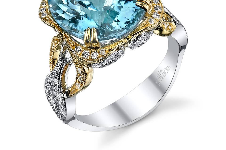 Style R3094 from the Parade in Color Collection <br> Scrolling 18K yellow and white gold set with 0.39 carats of dazzling diamonds showcase a 7.60 carat sky-blue aquamarine. Available in platinum, 18K white, 18K yellow, or 18K rose gold. All Parade Design styles can be customized upon request.