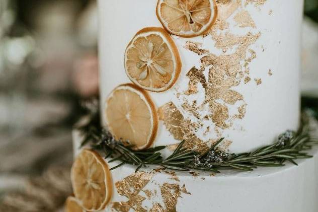 Rustic wedding cake with dried fruit decor