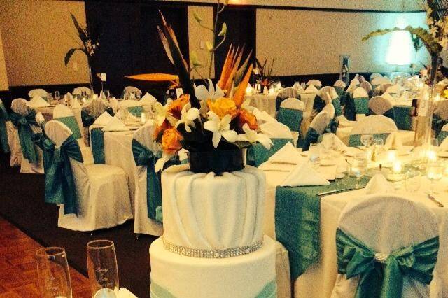 Classic and Cool Tiffany's Blue with Jewels Galore meets Fun & Vibrant Tropical for Julia & Zack's Wedding Day!Beautiful cake by Bella Christie's!Catering & Event Planning by Arista Catering & Event Planning