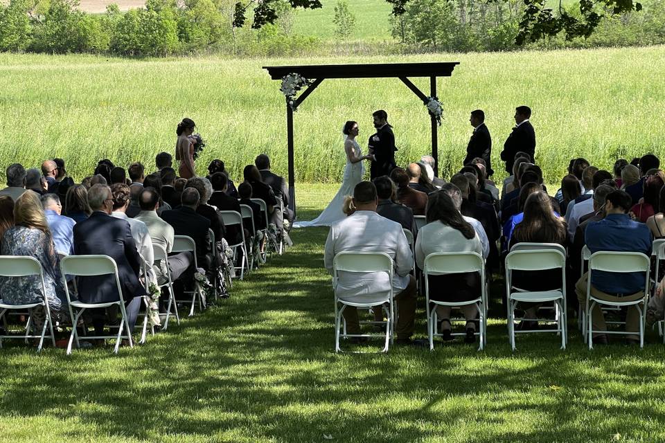 Ceremony overlooking the hay