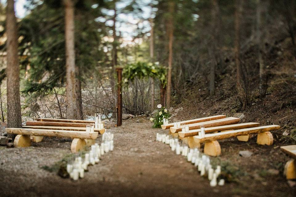 Wood benches at ceremony