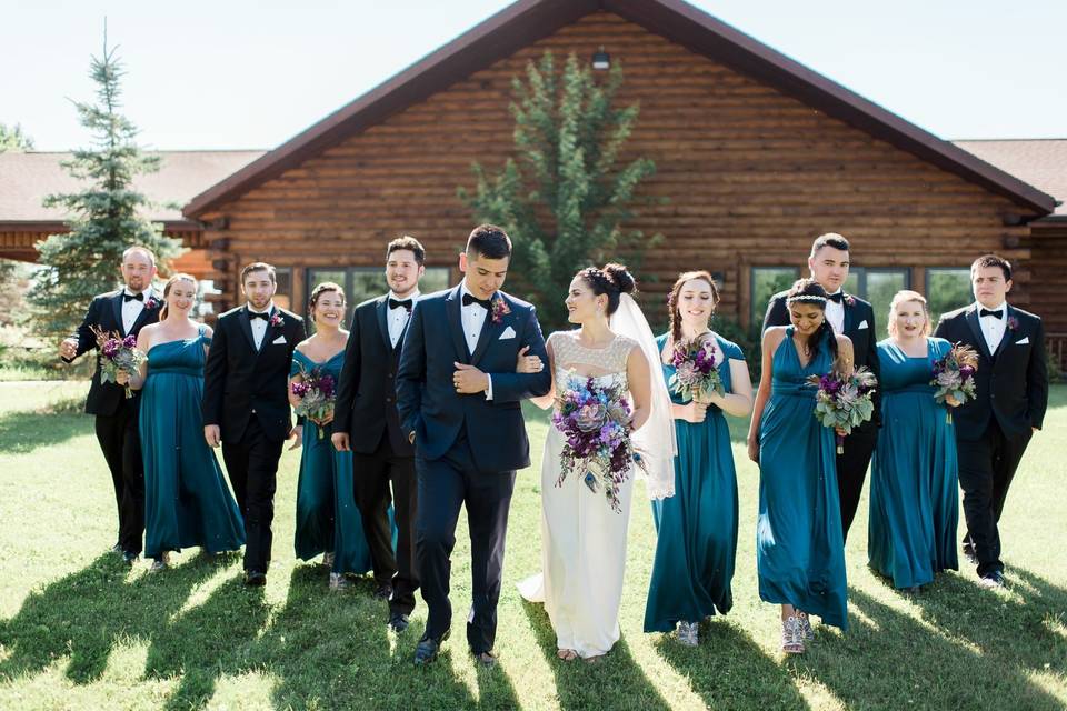 The newlyweds with the wedding attendants