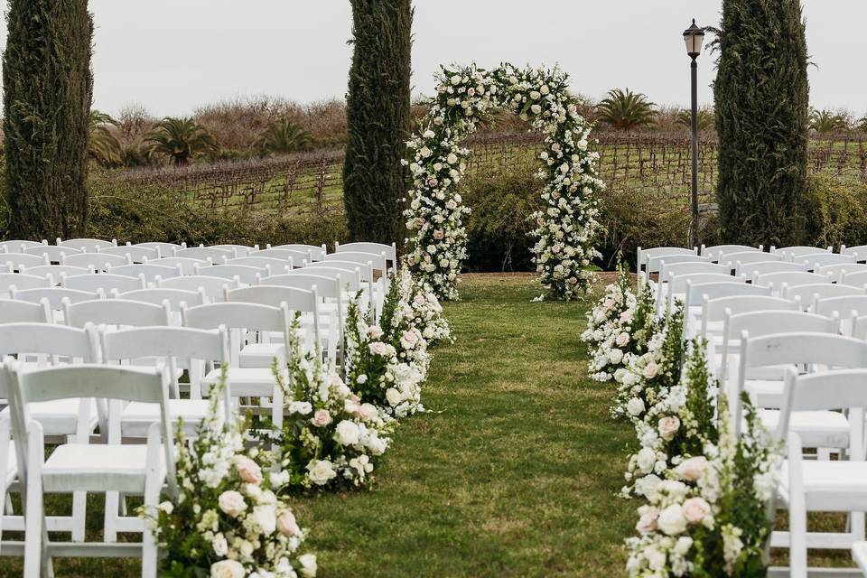 Aisle Decor with floral arch