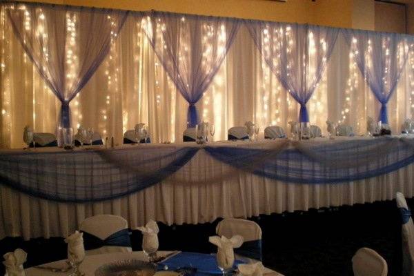 Wedding reception head table design by Poppyscott Events at Stoney Creek, Sioux City, IA