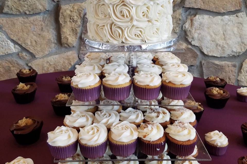 Wedding cake and cupcake display