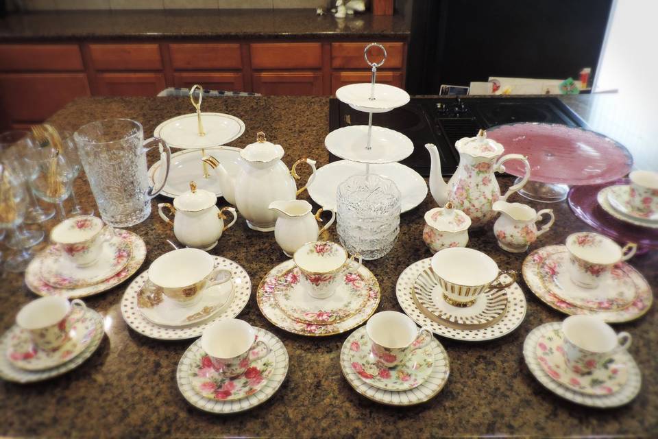Preparing for a Mother Daughter Tea.  The women sip from vintage Royal Albert fine bone china, while the little girls sip from delicate porcelain demitasse cups.